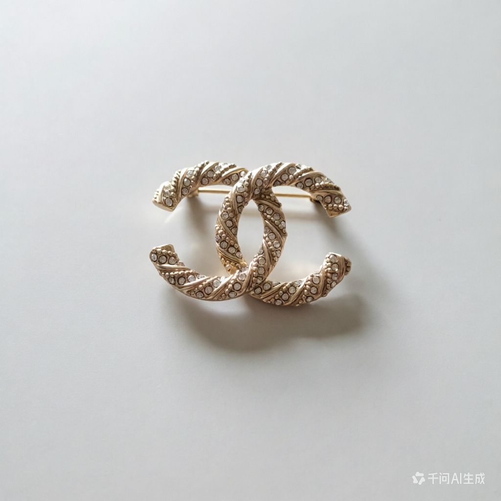CC brooch