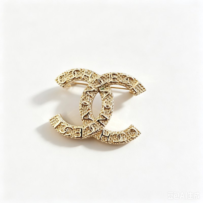 CC brooch