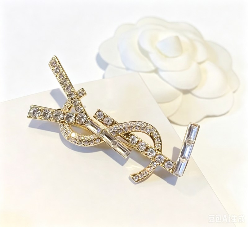 YSL brooch