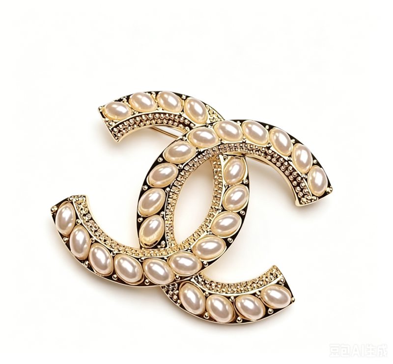 pearl CC brooch